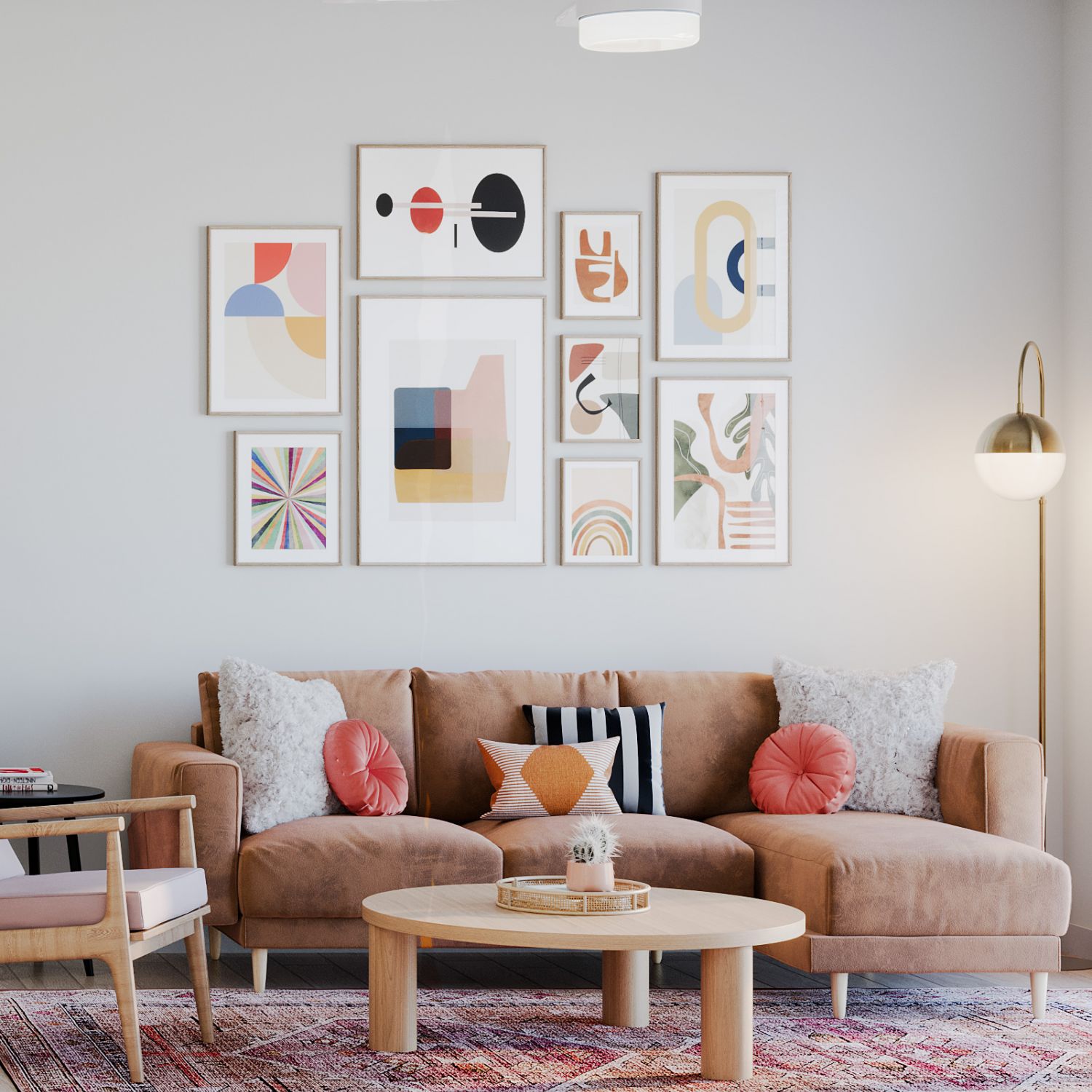 Wixby House Modern living room with tan sofa, colorful pillows, abstract wall art, round table, and floor lamp.